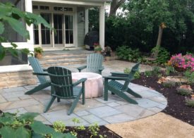 Beautiful backyard firepit and garden