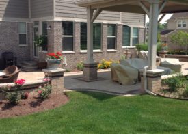 Outdoor patio with awning and garden